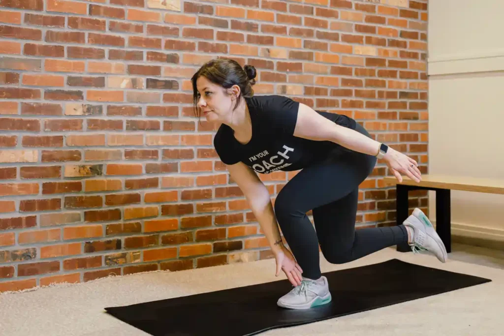 Tone Your Arms in Just One Week: Achieve Results Without the Gym! 1 A person exercising their arms at home with light weights Teddington