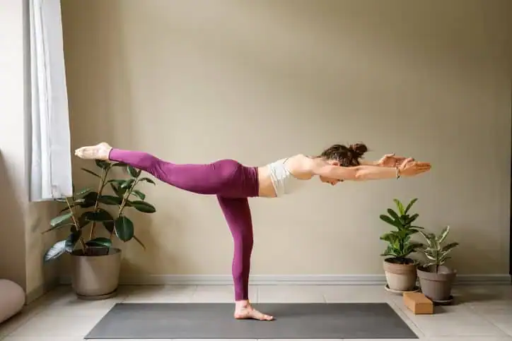 Achieving the Perfect Tone: How Often Should You Exercise for Results? 1 Woman doing Yoga exercise Teddington to help with toning the body.