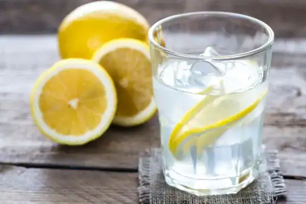 Hydration: The Secret Ingredient for a Toned Stomach and Enhanced Fitness 2 Image of lemon water to aid hydration Teddington