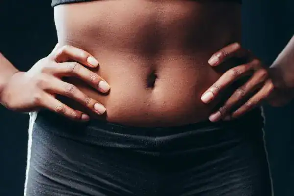 Toning Your Stomach: The Ultimate Guide to Achieving a Sculpted Stomach While Shedding Pounds 1 Image of a toned stomach after non surgical treatment Teddington